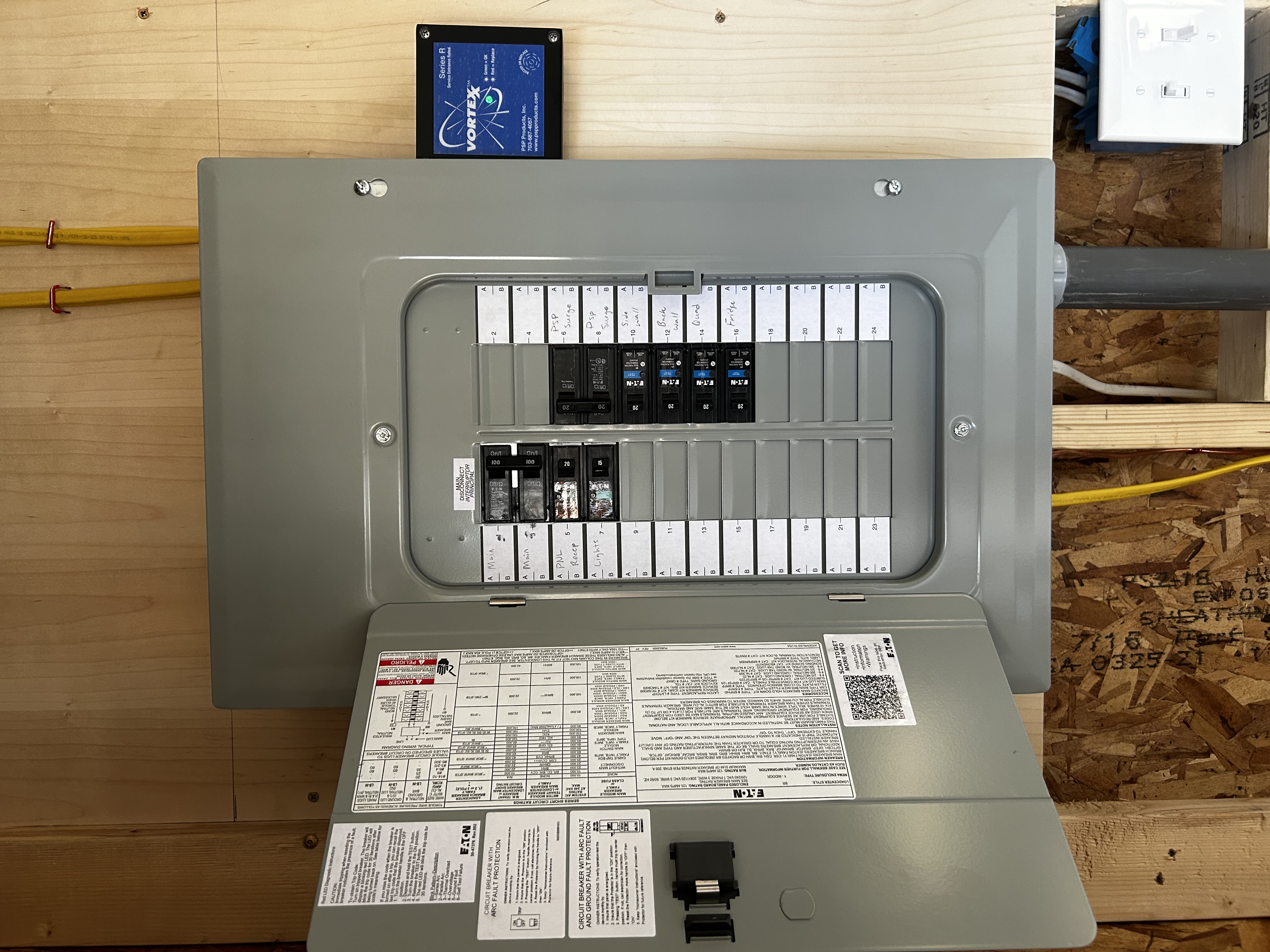 Open 100-amp detached-garage subpanel with Vortexx surge protection installed by CMD Electric in Baltimore County