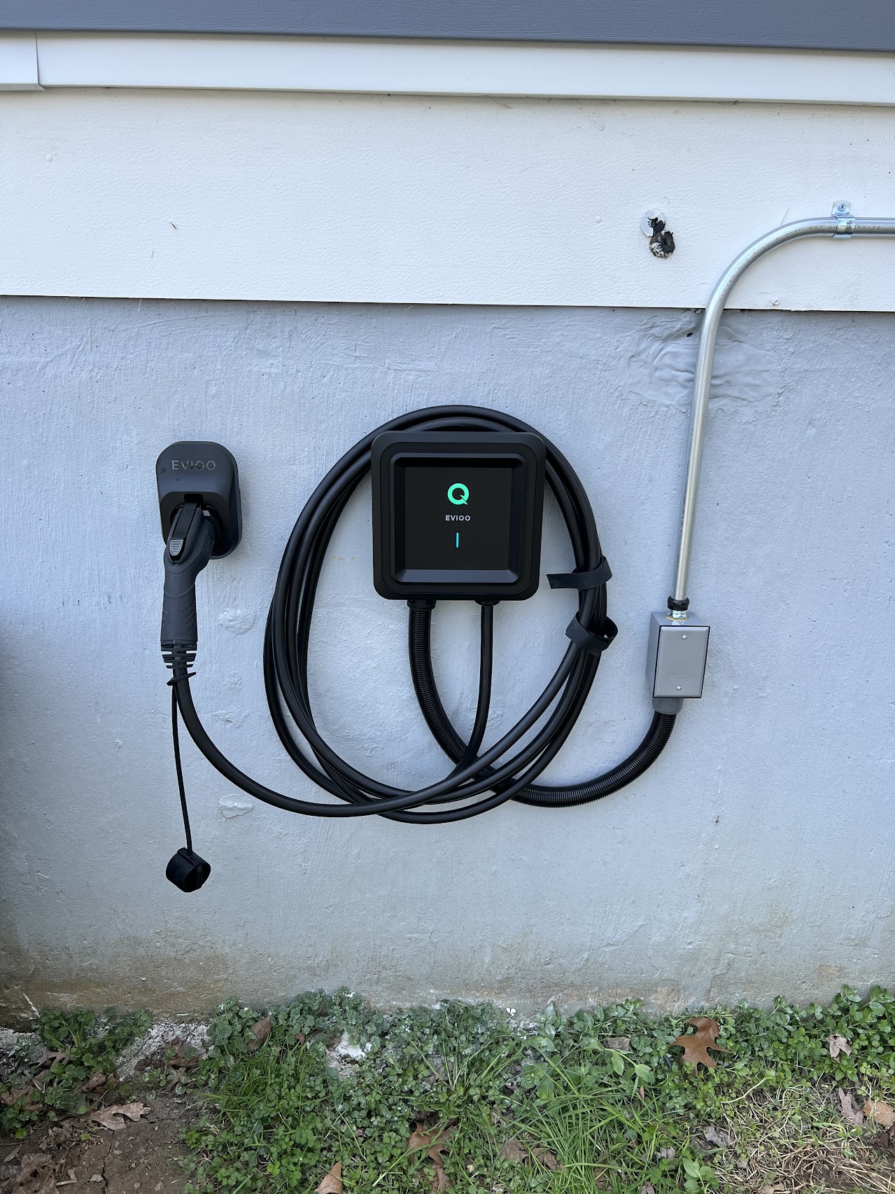 EVIQO Level 2 home EV charger installed outdoors