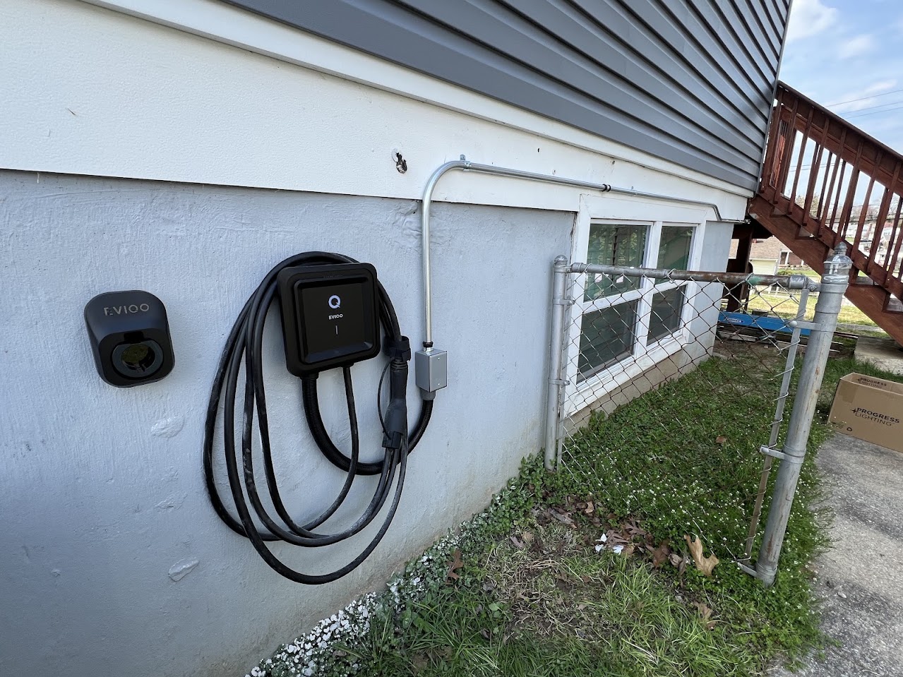 Outdoor EVIQO Level 2 EV charger installed by CMD Electric