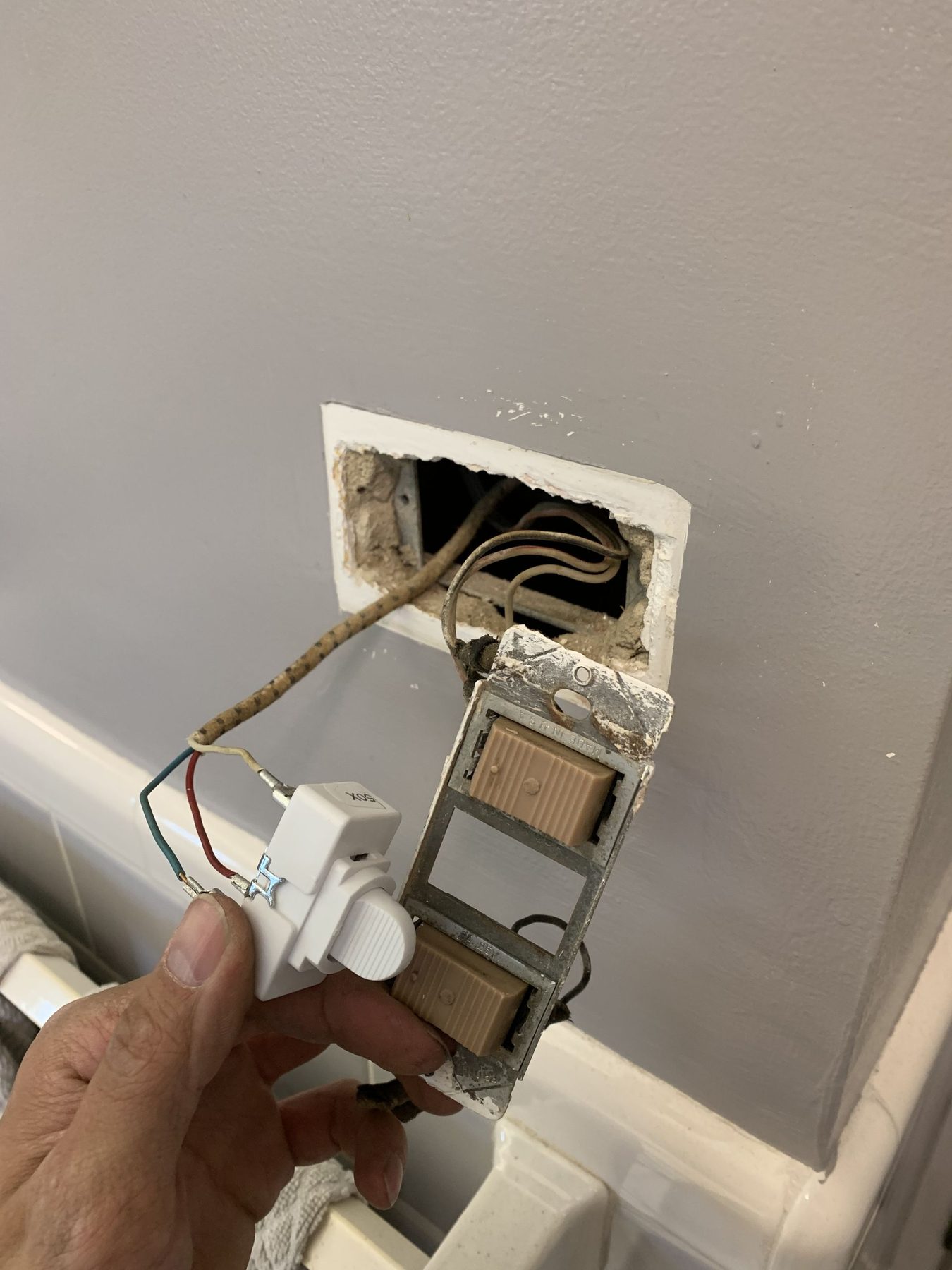 Electrical outlet wiring inspected during a CMD Electric service call